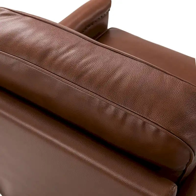 Fauteuil pivotant à 360° en cuir véritable classique avec garniture cloutée